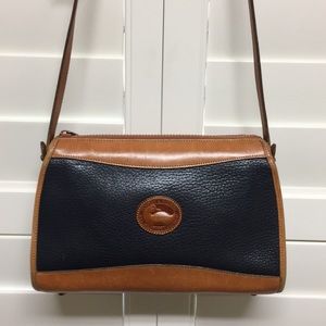 Dooney and Bourke Black/saddle tan leather purse